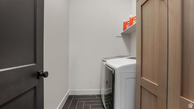 928 N Foxhunter Dr W, Farmington, UT 84025 - washroom featuring washing machine and dryer and baseboards
