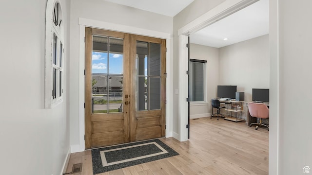 928 N Foxhunter Dr W, Farmington, UT 84025 - foyer entrance with baseboards and wood finished floors