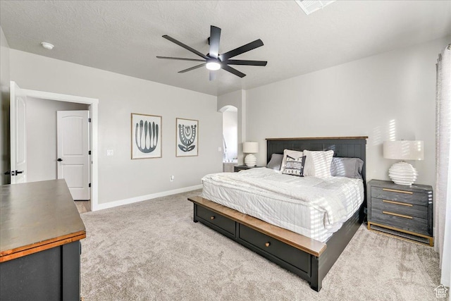 3459 S 2960 E, St George, UT 84790 - carpeted bedroom with baseboards, visible vents, arched walkways, and ceiling fan