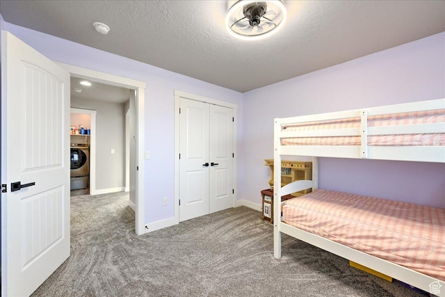 3459 S 2960 E, St George, UT 84790 - unfurnished bedroom with a closet, carpet flooring, baseboards, and washer / clothes dryer