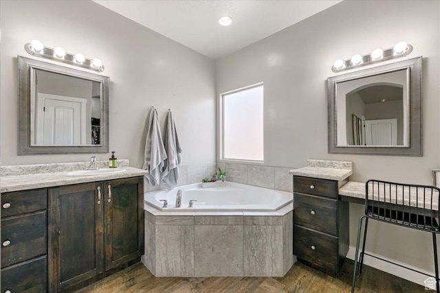 3459 S 2960 E, St George, UT 84790 - bathroom with wood finished floors, a garden tub, and vanity
