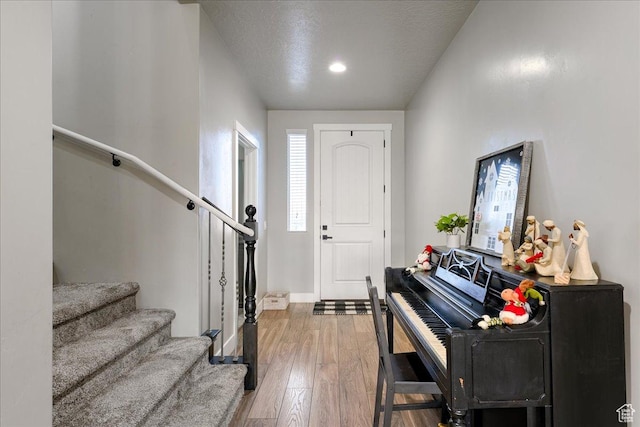 3459 S 2960 E, St George, UT 84790 - entrance foyer with baseboards, hardwood / wood-style floors, and stairs