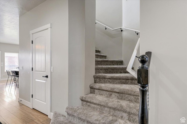 3459 S 2960 E, St George, UT 84790 - stairs featuring baseboards and wood finished floors
