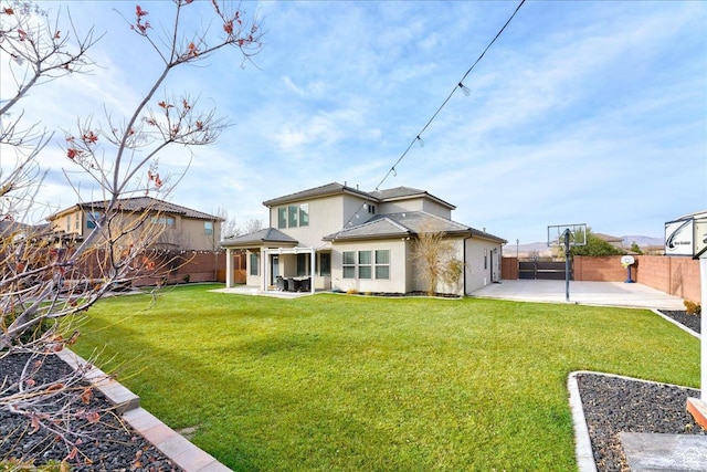 3459 S 2960 E, St George, UT 84790 - rear view of property featuring a patio area, a lawn, and a fenced backyard