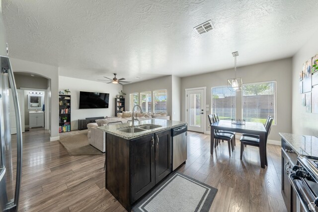 3459 S 2960 E, St George, UT 84790 - kitchen featuring stainless steel appliances, a sink, visible vents, wood finished floors, and ceiling fan