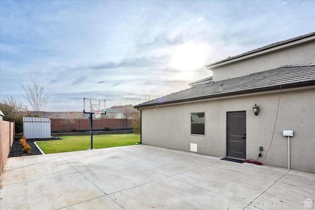 3459 S 2960 E, St George, UT 84790 - view of patio / terrace featuring fence, an outbuilding, and a storage shed