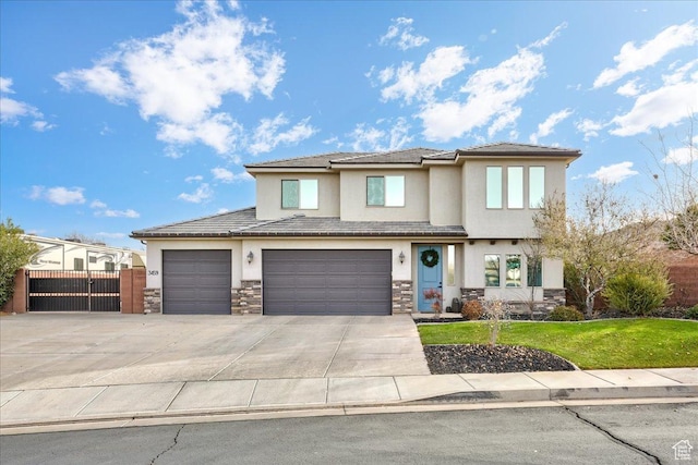 view of front facade with a front yard and a garage