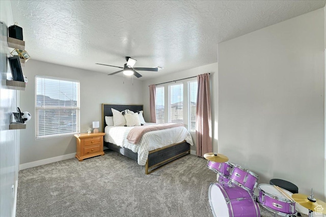 3459 S 2960 E, St George, UT 84790 - bedroom featuring ceiling fan, baseboards, multiple windows, and light colored carpet