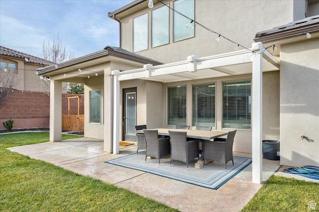 3459 S 2960 E, St George, UT 84790 - rear view of house with a patio area, outdoor dining area, stucco siding, and fence