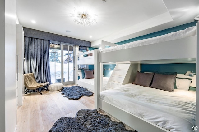 41 E Silver Star Ct Unit C-19, Park City, UT 84060 - bedroom with wood finished floors and access to outside