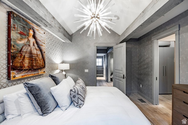 41 E Silver Star Ct Unit C-19, Park City, UT 84060 - bedroom featuring lofted ceiling, light wood finished floors, a chandelier, and a ceiling fan