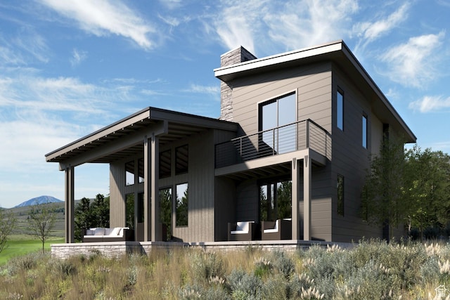 6061 Golf Clb, Link, Park City, UT 84098 - rear view of house featuring a mountain view, a balcony, and an outdoor living space