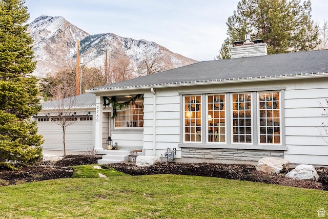2760 E Spring Creek Rd, Holladay, UT 84117 - exterior space with a garage, a mountain view, and a yard