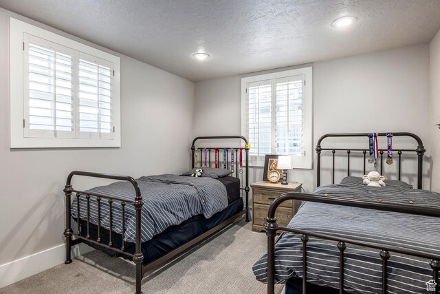 2760 E Spring Creek Rd, Holladay, UT 84117 - bedroom with carpet floors and a textured ceiling