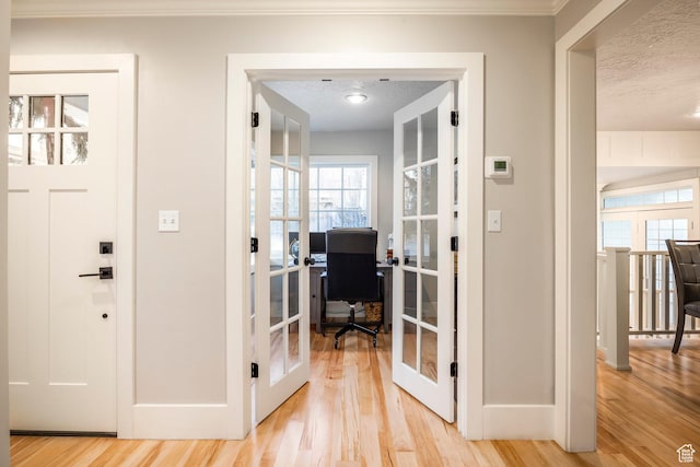 2760 E Spring Creek Rd, Holladay, UT 84117 - office area featuring a textured ceiling, light hardwood / wood-style flooring, crown molding, and french doors