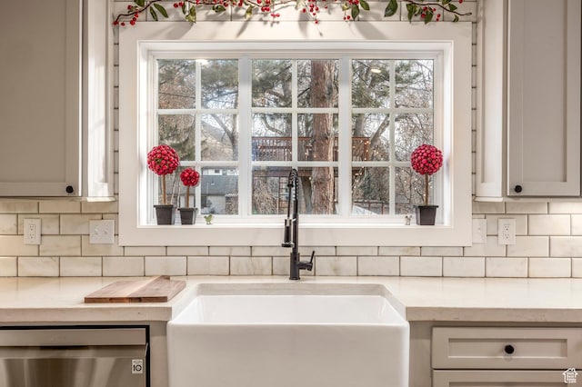 2760 E Spring Creek Rd, Holladay, UT 84117 - kitchen featuring stainless steel dishwasher, tasteful backsplash, and sink