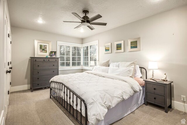 2760 E Spring Creek Rd, Holladay, UT 84117 - carpeted bedroom with ceiling fan and a textured ceiling
