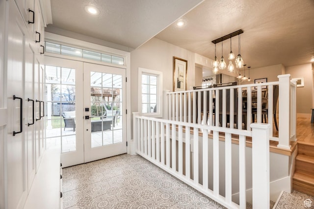 2760 E Spring Creek Rd, Holladay, UT 84117 - doorway to outside with a notable chandelier, french doors, a wealth of natural light, and light tile patterned flooring
