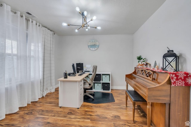 685 E Bullrush Pkwy E, Lehi, UT 84043 - office space with hardwood / wood-style floors and an inviting chandelier