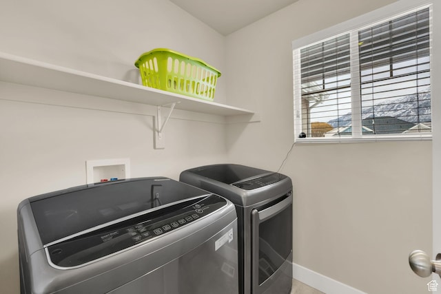 143 E 1825 N, North Ogden, UT 84414 - laundry area with separate washer and dryer and baseboards