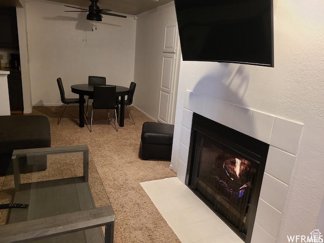 150 W Ridge View St Unit 215, Brian Head, UT 84719 - dining space featuring a ceiling fan, a tile fireplace, and carpet floors
