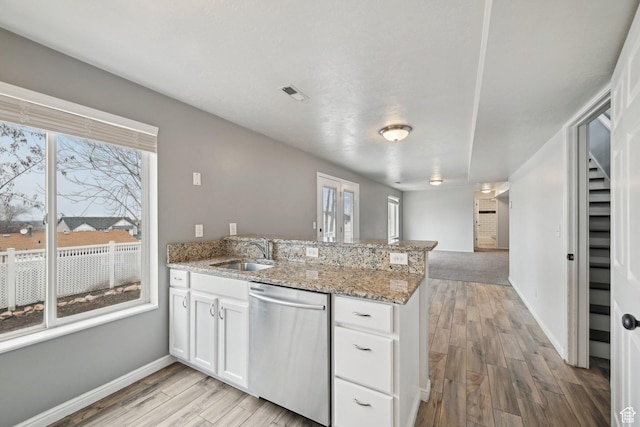 854 S 200 E, Farmington, UT 84025 - kitchen with white cabinets, a sink, light wood-type flooring, dishwasher, and a peninsula