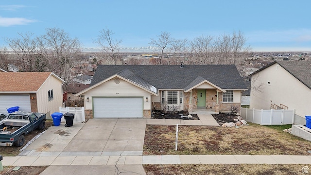 854 S 200 E, Farmington, UT 84025 - view of front of home featuring stone siding, fence, and driveway