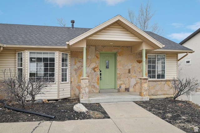 854 S 200 E, Farmington, UT 84025 - view of front of home featuring stone siding and roof with shingles