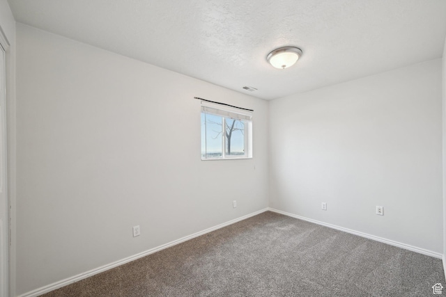 854 S 200 E, Farmington, UT 84025 - spare room featuring carpet, visible vents, a textured ceiling, and baseboards