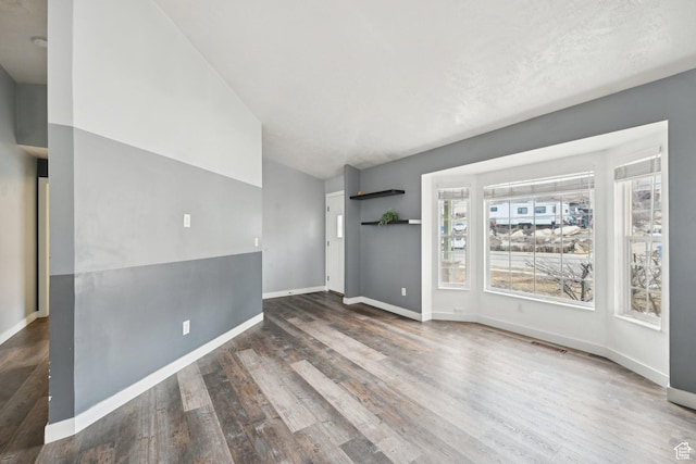 854 S 200 E, Farmington, UT 84025 - empty room with wood finished floors, visible vents, and baseboards