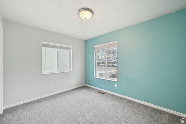 854 S 200 E, Farmington, UT 84025 - carpeted empty room featuring baseboards, visible vents, and a textured ceiling