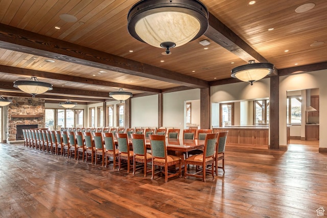 200 E 7000 S, Hyrum, UT 84319 - dining area with hardwood / wood-style flooring, recessed lighting, a wooden ceiling with exposed beams, and a stone fireplace