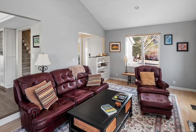 7996 S Sunnyoak Cir E, Cottonwood Heights, UT 84121 - living room with light hardwood / wood-style floors and vaulted ceiling