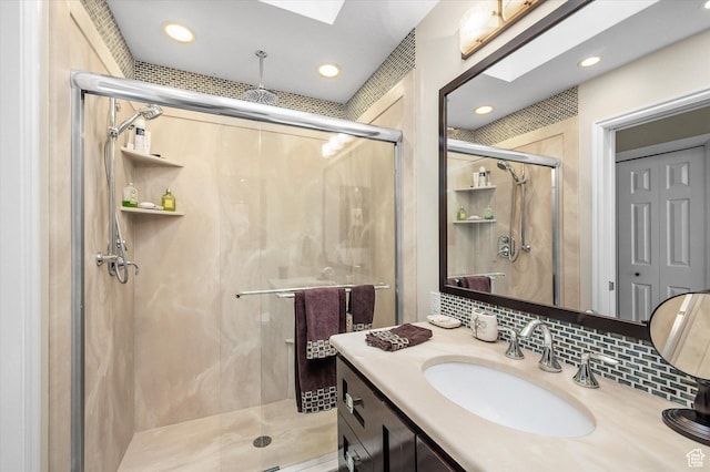 7996 S Sunnyoak Cir E, Cottonwood Heights, UT 84121 - bathroom with vanity, a skylight, and an enclosed shower