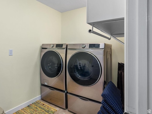 7996 S Sunnyoak Cir E, Cottonwood Heights, UT 84121 - clothes washing area with separate washer and dryer and light tile patterned flooring
