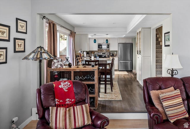 7996 S Sunnyoak Cir E, Cottonwood Heights, UT 84121 - dining room with wood finished floors and baseboards