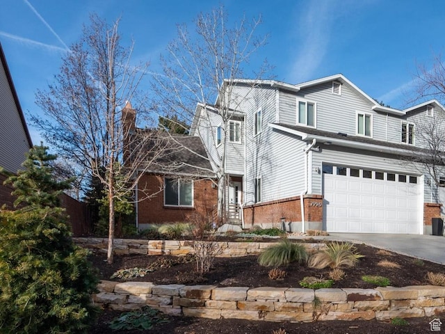 7996 S Sunnyoak Cir E, Cottonwood Heights, UT 84121 - view of front property with a garage