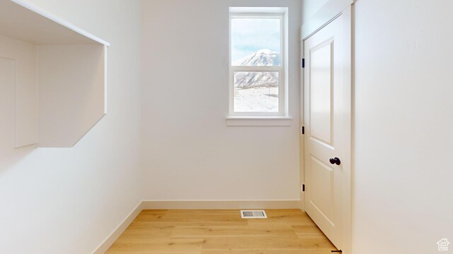 99 E 1590 S Unit 31, Salem, UT 84653 - doorway featuring light wood-style floors and baseboards