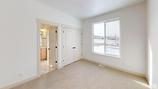 99 E 1590 S Unit 31, Salem, UT 84653 - unfurnished bedroom with carpet flooring, baseboards, and ensuite bathroom
