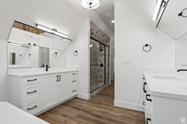 1539 W 2130th Cir S, St George, UT 84770 - bathroom featuring vanity, hardwood / wood-style flooring, and a shower with door