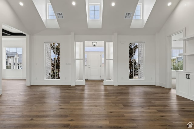 1539 W 2130th Cir S, St George, UT 84770 - foyer featuring a skylight, high vaulted ceiling, dark wood-style flooring, and recessed lighting