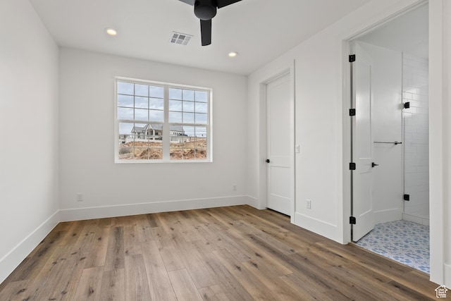 1539 W 2130th Cir S, St George, UT 84770 - unfurnished bedroom featuring light hardwood / wood-style flooring and ceiling fan