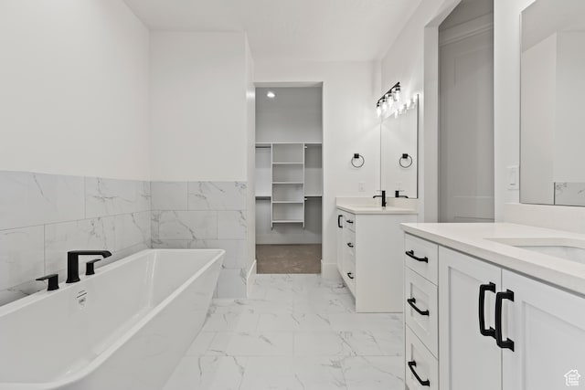 1539 W 2130th Cir S, St George, UT 84770 - bathroom with a bath, vanity, and tile walls
