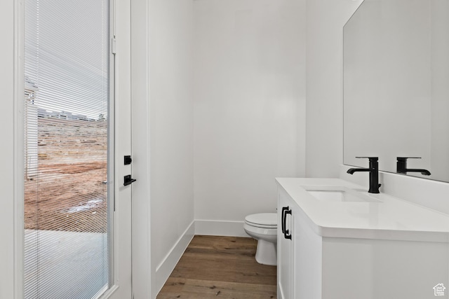 1539 W 2130th Cir S, St George, UT 84770 - bathroom with vanity, wood-type flooring, and toilet