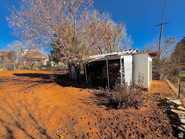 exterior space featuring an outbuilding