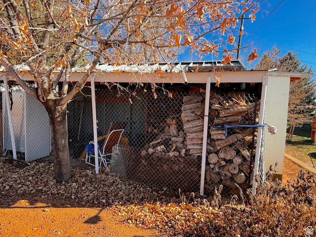 view of side of property featuring an outbuilding