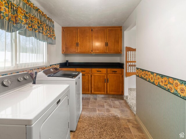 5304 W 20400 N, Plymouth, UT 84330 - clothes washing area featuring separate washer and dryer, cabinets, and a textured ceiling