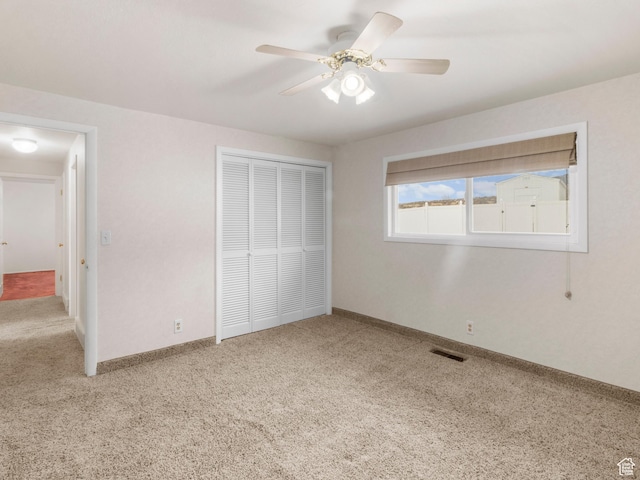 5304 W 20400 N, Plymouth, UT 84330 - unfurnished bedroom with carpet floors, a closet, and ceiling fan