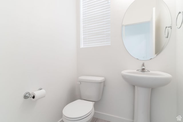 bathroom featuring toilet