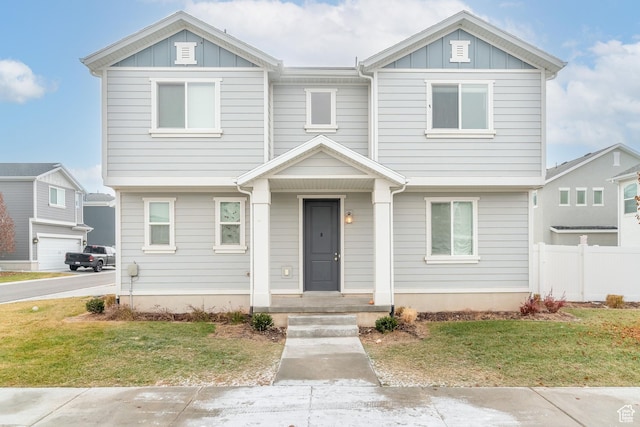 view of front facade featuring a front yard